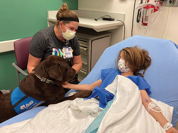 Four-Legged Employees Bring Out the Best in Patients and Families