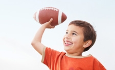 Boy throwing a football