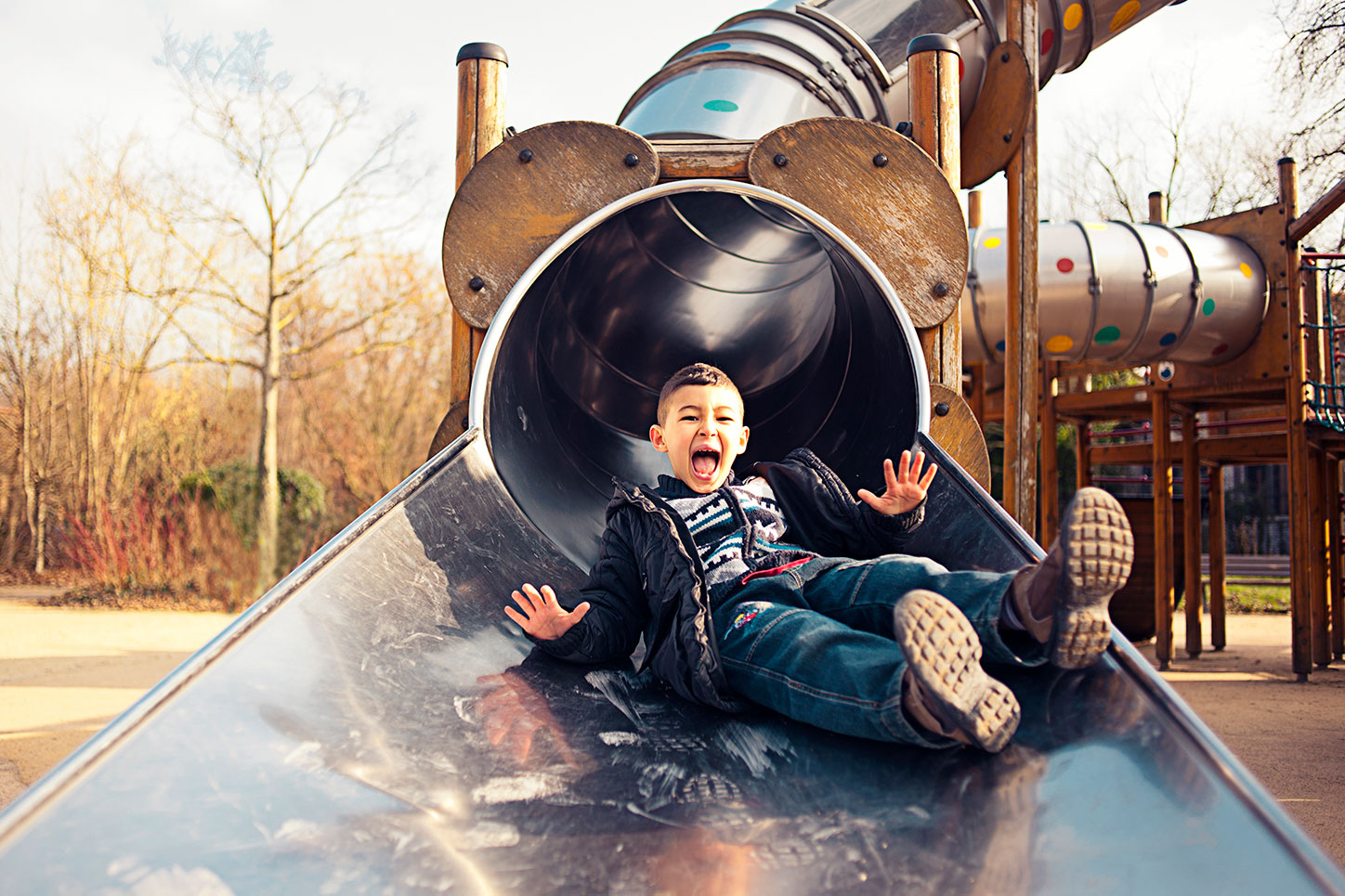 Kid on a playground slide