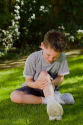 Boy with cut on knee