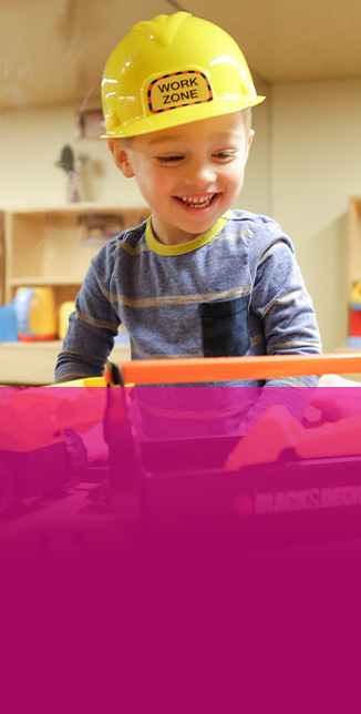 Kid having fun in the playroom at St. Louis Children’s