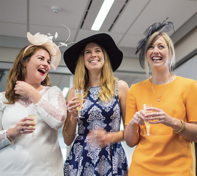 Image of women in hats