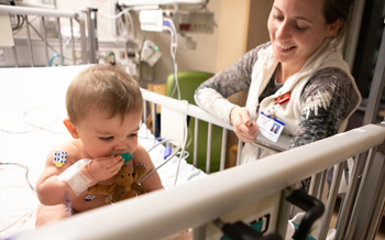 Infant with cardiologist at St Louis pediatric heart center 