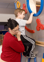 Child in therapy gym