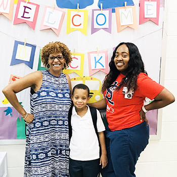 Devonté Banks gets the support he needs from his mom Dana Johnson (left) and Kirsten Wilford, HKHM school nurse at Lexington Elementary School
