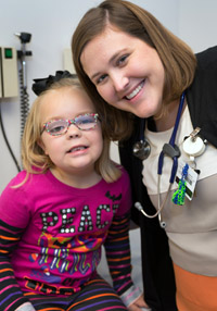 Nurse with patient at the Cancer Predisposition Program