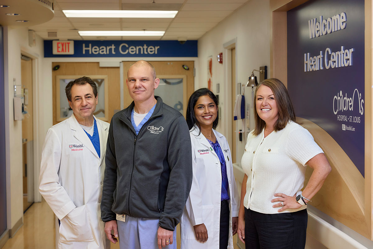 Dr. Jacob Miller and team smiling