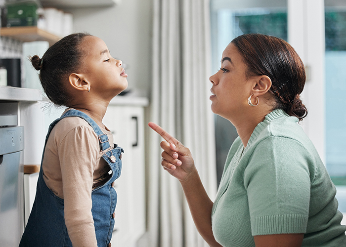 Mom talking to her daughter