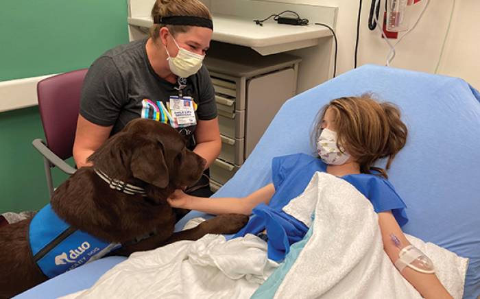 Four-Legged Employees Bring Out the Best in Patients and Families