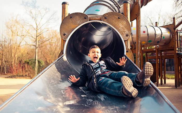 Kid on a playground slide