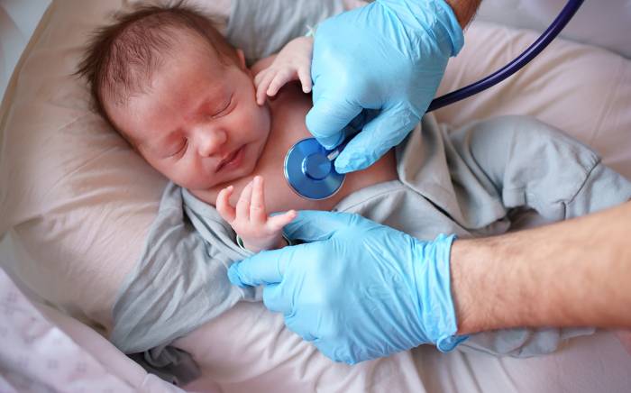 Baby being examined at the doctor's office