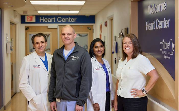 Dr. Jacob Miller and team smiling